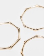 pack of 3 bangle bracelets with bamboo detail in gold tone