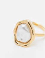 claw set pearl ring in 18k gold plated