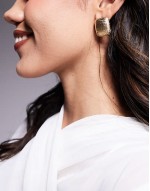 earrings in textured rounded square design in gold tone