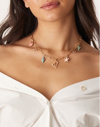 heart and coastal multicharm  necklace in gold