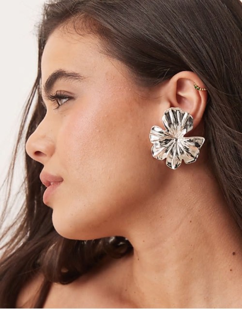 stud earrings with hibiscus floral design in silver tone